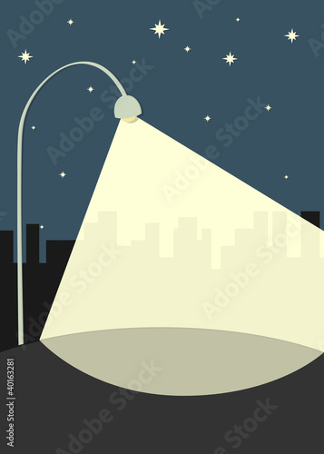 street lamp illuminates the sidewalk