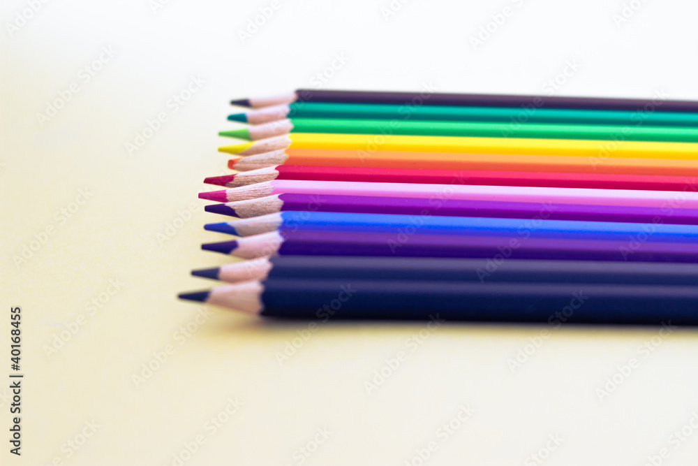 rainbow of pencil colours, selective focus rainbow of pencil colours, selective focus