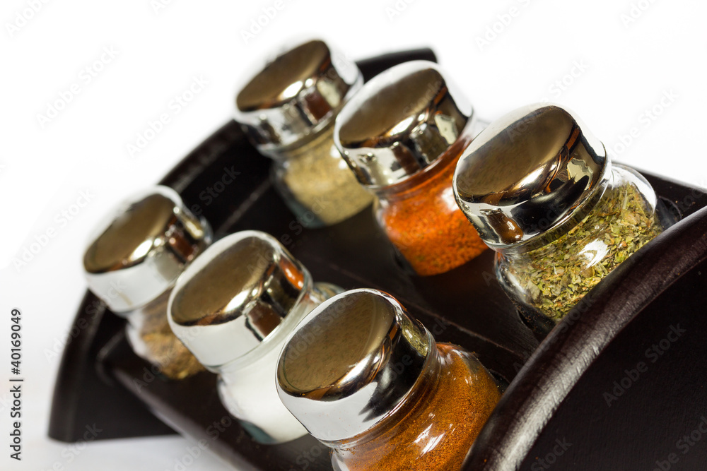 spices in glass bottle spices in glass bottle
