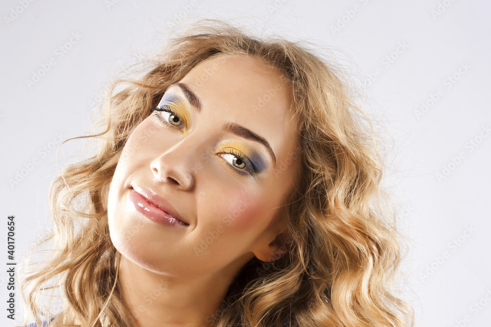 Curly blonde with bright makeup Curly blonde with bright makeup