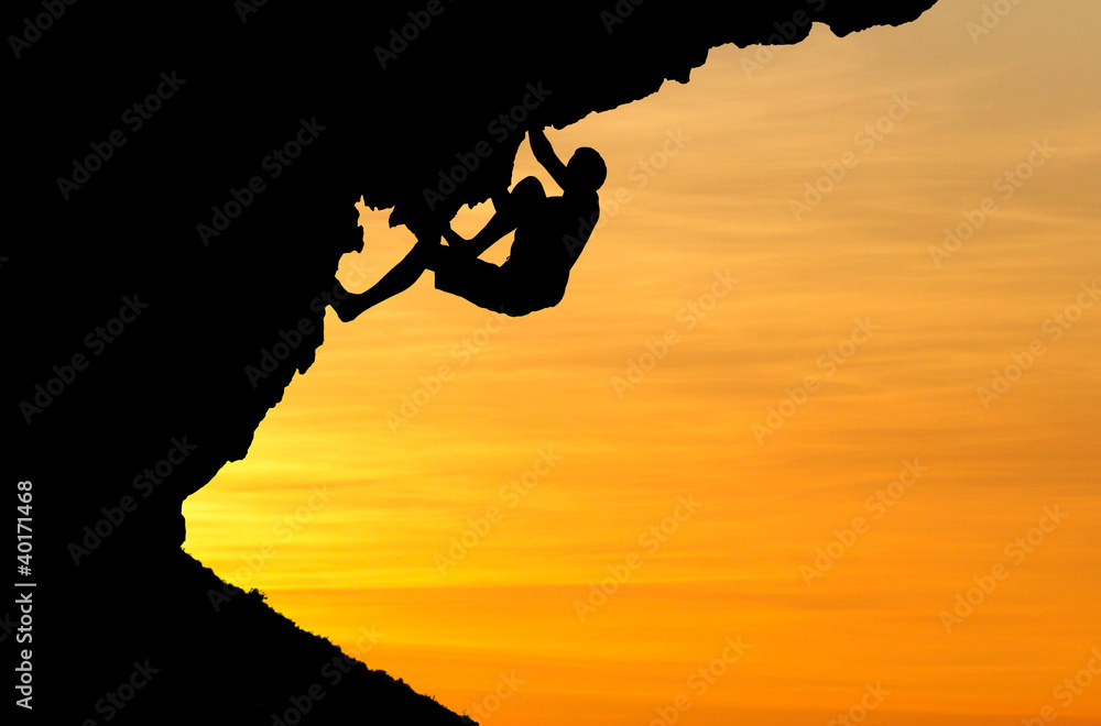 silhouette of climber in sunset