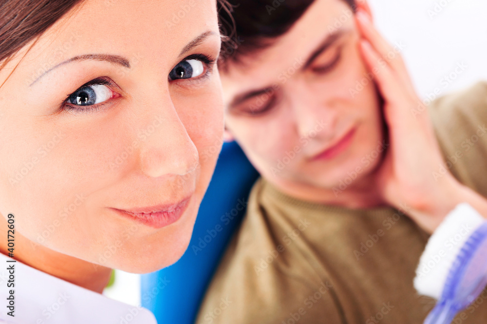 Young dentist assiatant recomending to care about teeth Young dentist assiatant recomending to care about teeth