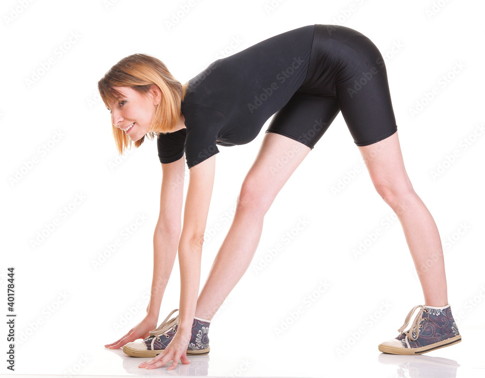 Sport Young woman doing exercise isolated on white Sport Young woman doing exercise isolated on white