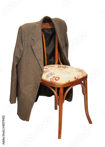 Green jacket hangs on a chair