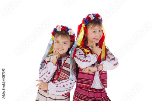 A child, two girls in a bright dress.