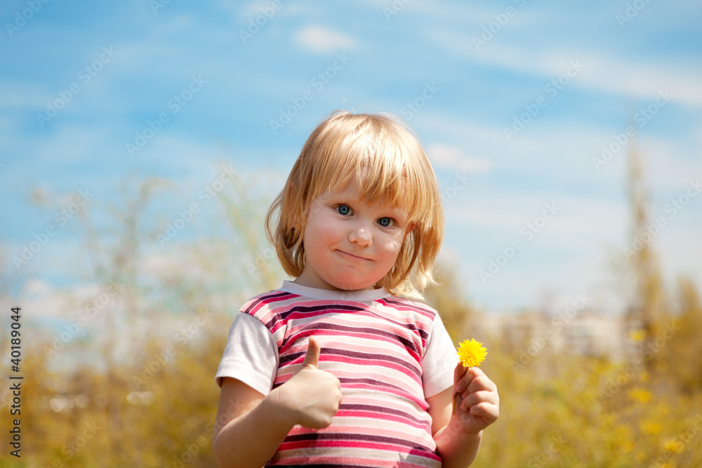 child outdoors in spring child outdoors in spring