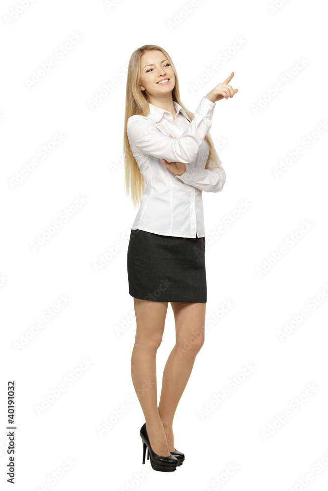 Beautiful blond business woman pointing at copy space Beautiful blond business woman pointing at copy space