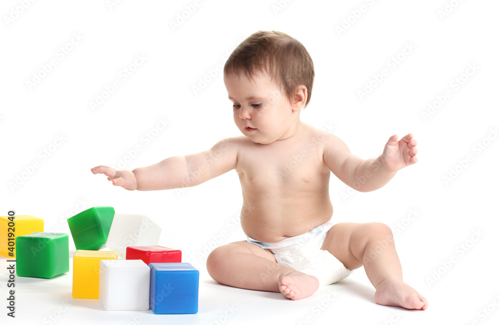 Cute baby girl playing with cubes isolated on white Cute baby girl playing with cubes isolated on white