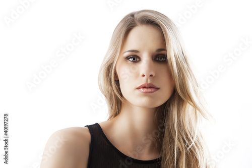 natural blond woman, she looks in to the lens