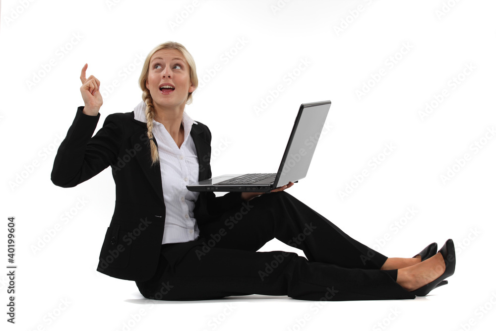 woman sitting on the floor with laptop and having a idea woman sitting on the floor with laptop and having a idea