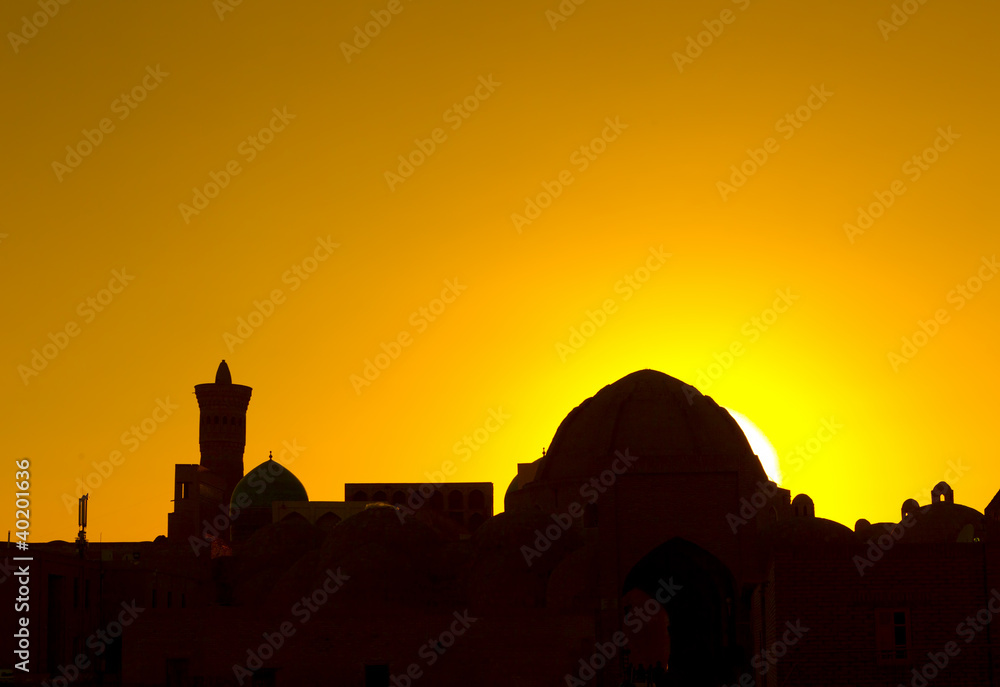 silhouette of a mosque in sunset