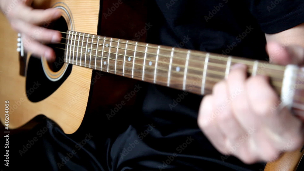 man playing the guitar man playing the guitar