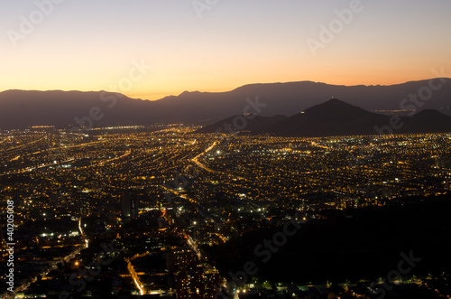 The city at night, among the mountains