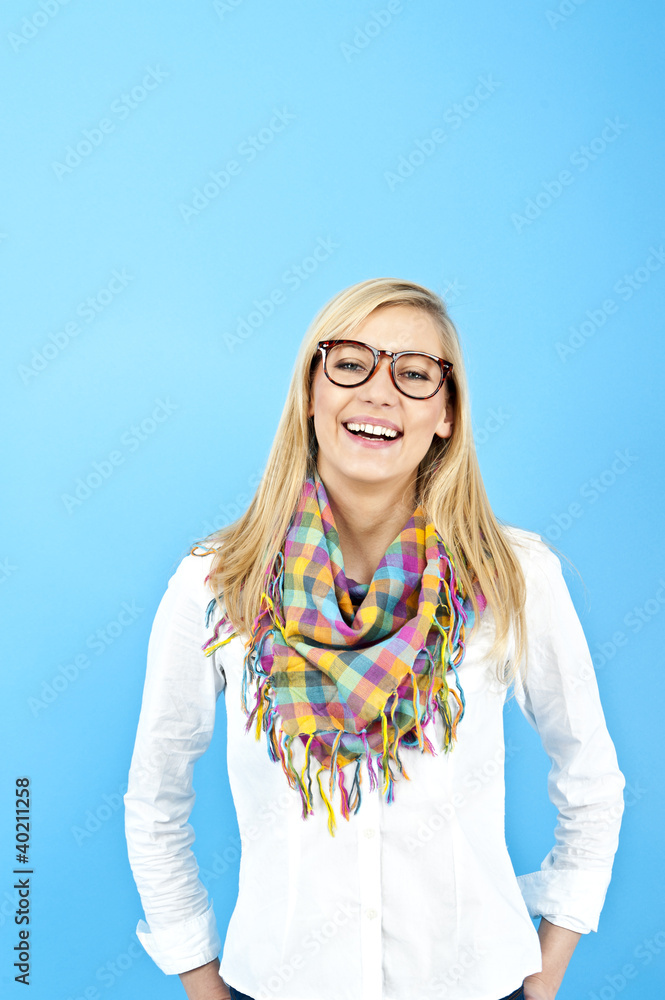 Young woman against the blue background Young woman against the blue background