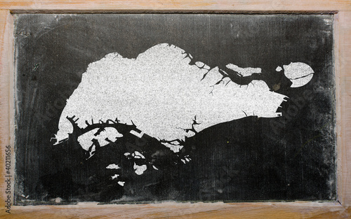 Photography outline map of singapore on blackboard