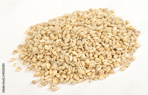 Pearl barley heap isolated on white