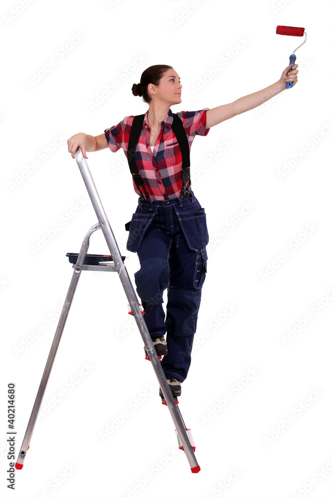 Painter standing on a stepladder Painter standing on a stepladder