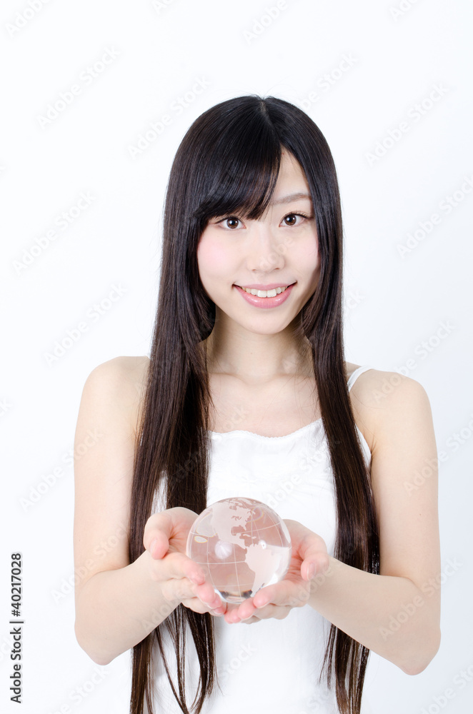 attractive asian woman holding a earth crystal ball attractive asian woman holding a earth crystal ball