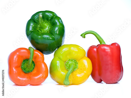 Four pepper on white background