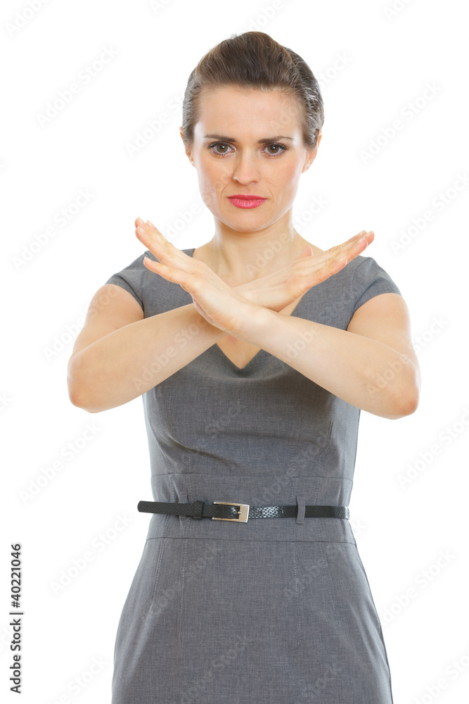 Modern business woman showing stop gesture Modern business woman showing stop gesture