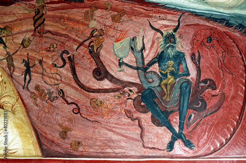 Evil and hell on a Romanian mural in Tismana monastery photo