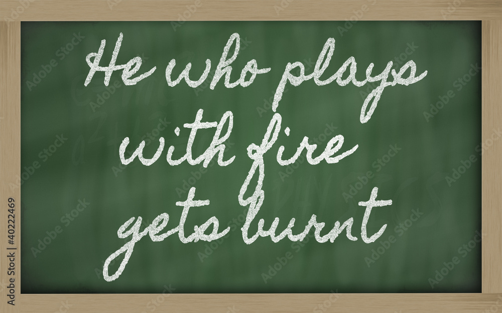 expression - He who plays with fire gets burnt - written on a s expression - He who plays with fire gets burnt - written on a s