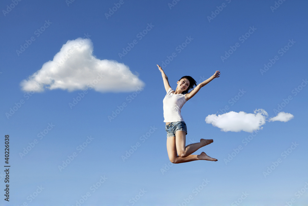 Asian woman jumping happily