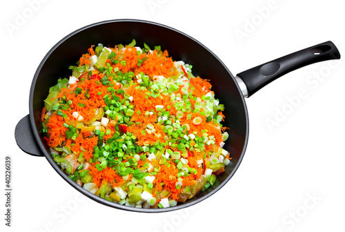 Frying pan with the cut vegetables