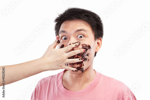 Asian man and chocolate spread