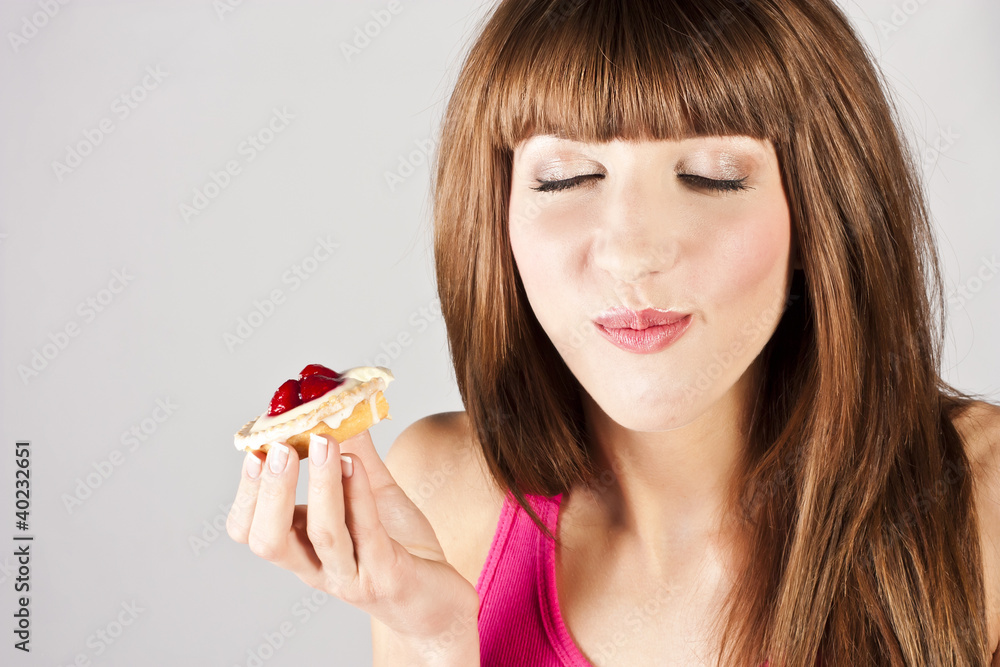 Young beautiful woman with a cake Young beautiful woman with a cake