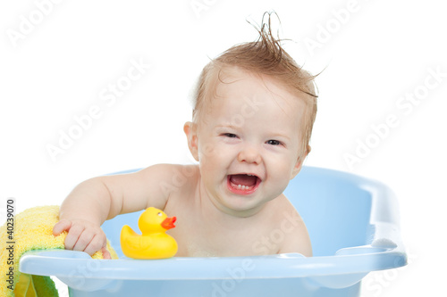 adorable baby having bath i...