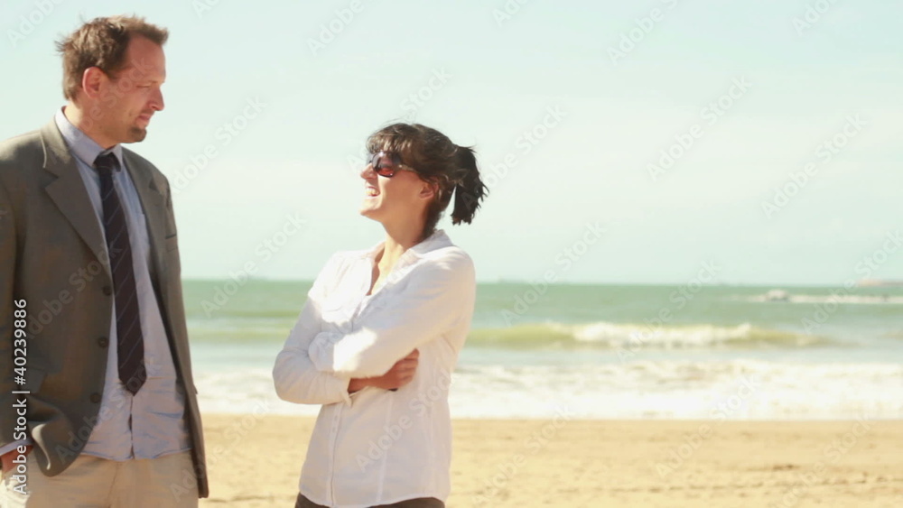 Young happy business people on the beach Young happy business people on the beach
