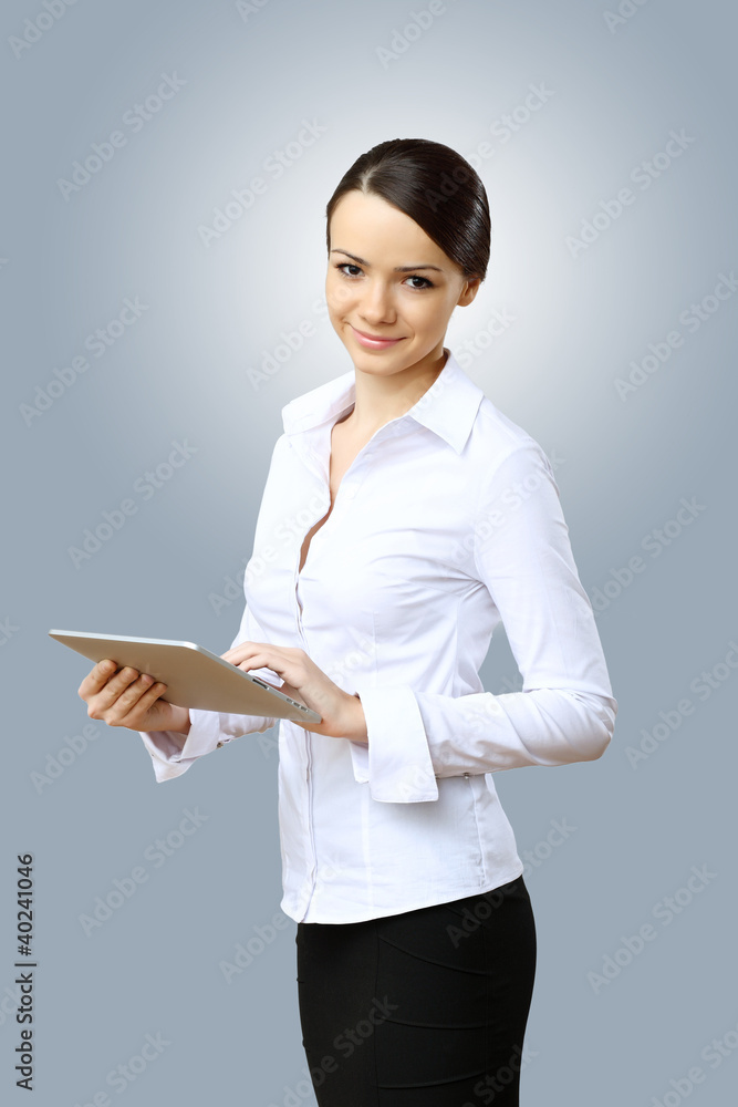 Young beautiful woman in business wear at work Young beautiful woman in business wear at work