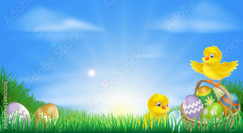 Yellow Easter chicks and eggs background