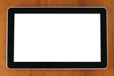Touch screen device on wooden background