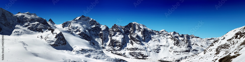 Panorama of snowy mountain ridges in Diavolezza Switzerland