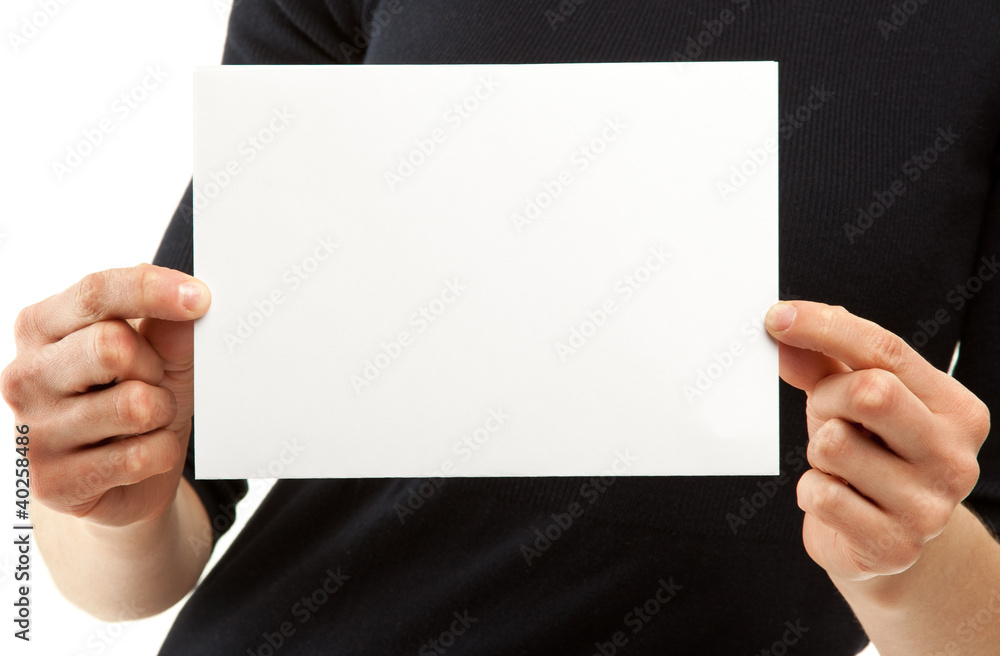 Woman's hands holding blank sheet of paper Woman's hands holding blank sheet of paper