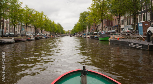 Fototapeta Naklejka Na Ścianę i Meble -  Amsterdam Canal from Boat on Canal