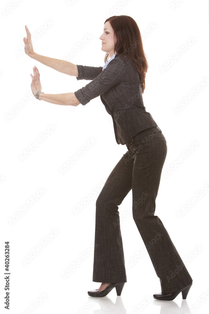 business woman pushing business woman pushing