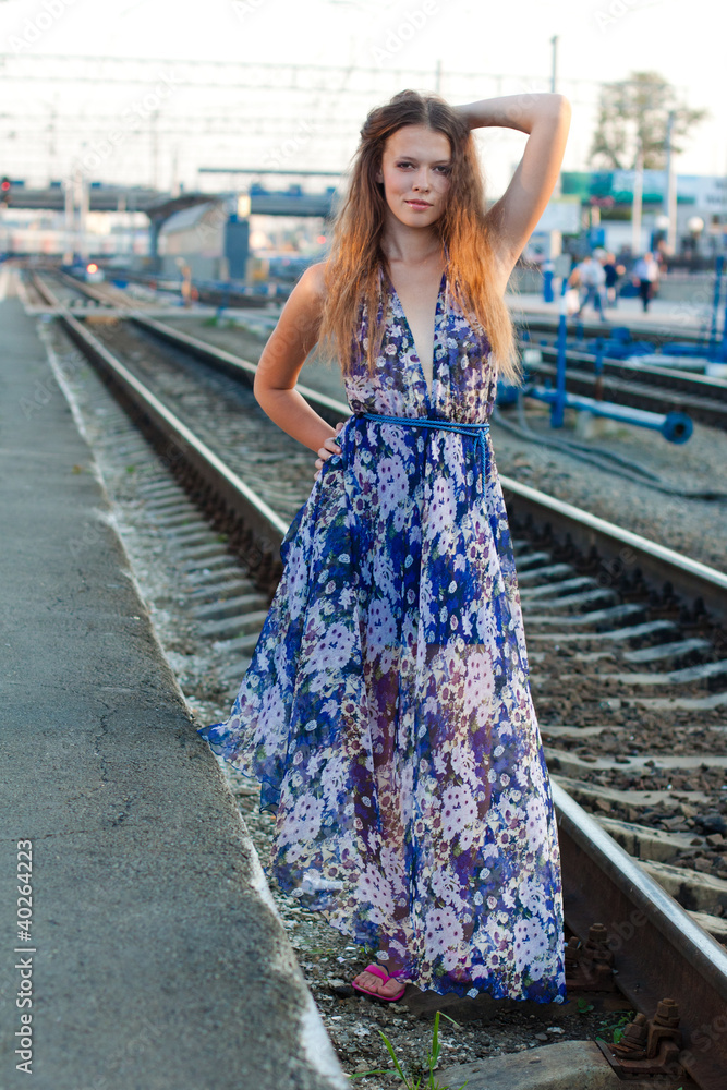 Woman waiting train on the platform