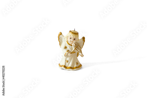 porcelane angel with violine isolated on white photo