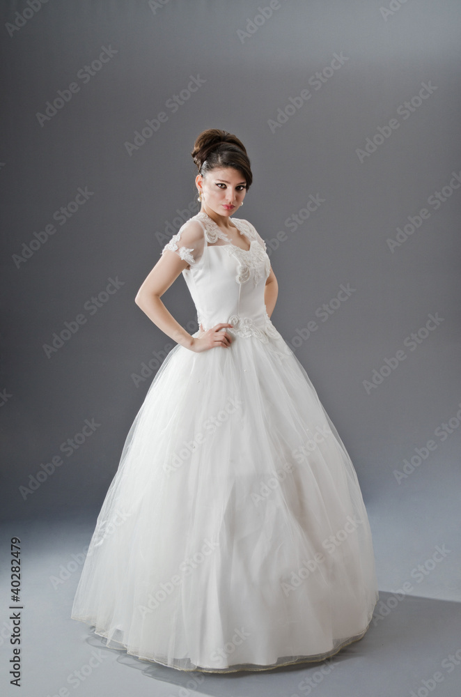 Bride in wedding dress in studio shooting