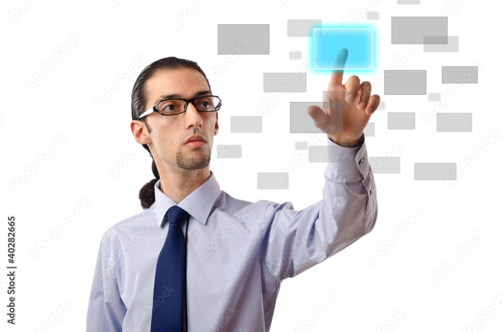 Businessman pressing virtual buttons Businessman pressing virtual buttons