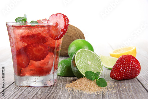Fruit cocktail over wood ba...