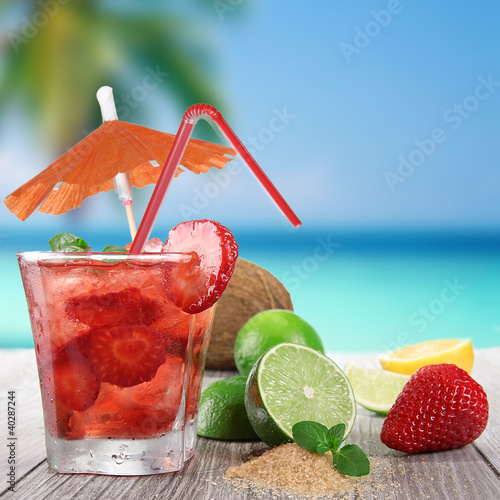 Fresh fruit cocktail on a b...