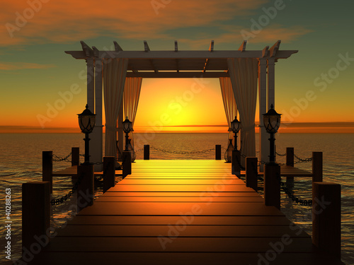 wedding gazebo on the wooden pier into the sea at sunset #40288263