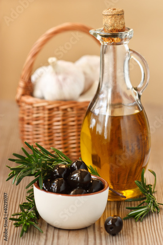 Olive oil and olives.