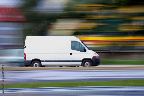 Blur white van  panning and move