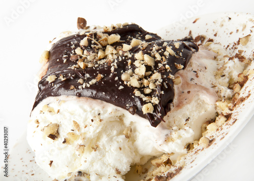 Vanilla ice cream with chocolate and nuts