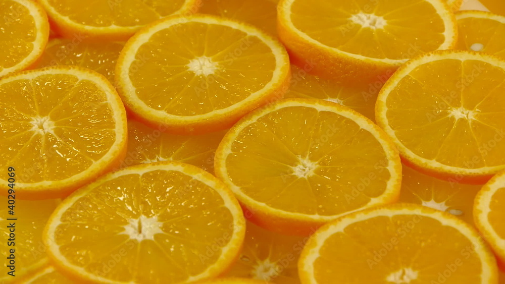 sliced oranges close up. Seamless loop. sliced oranges close up. Seamless loop.